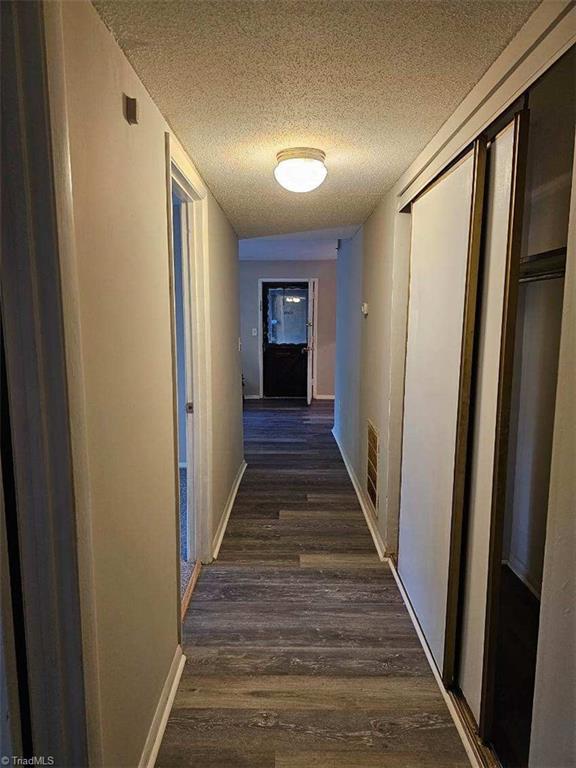 2270 Sunderland Road, Unit 12A Winston-Salem, NC 27103 - Photo 23 of 38 HALLWAY VIEW FROM PRIMARY BEDROOM