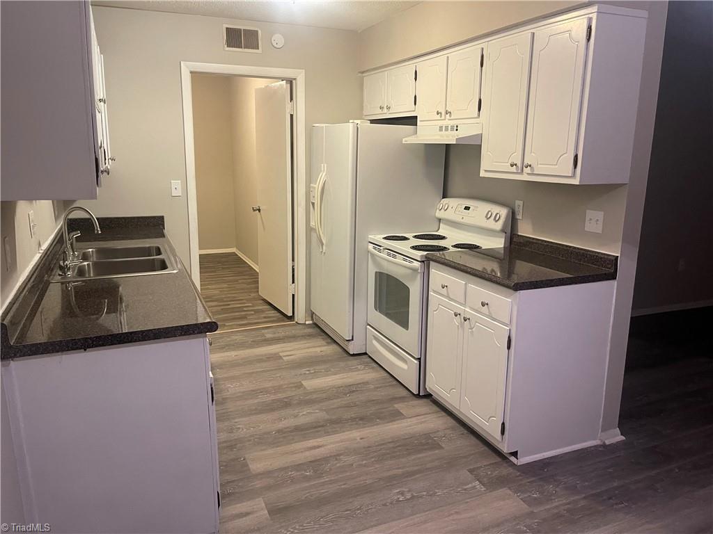 2270 Sunderland Road, Unit 12A Winston-Salem, NC 27103 - Photo 9 of 38 UPDATED KITCHEN COUNTERTOPS