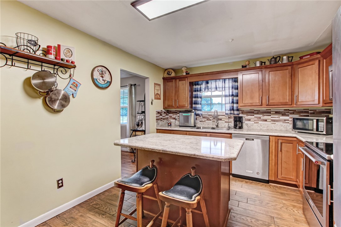 85091 Radio Avenue Yulee, FL 32097 - Photo 11 of 35 a kitchen with a table and chairs in it