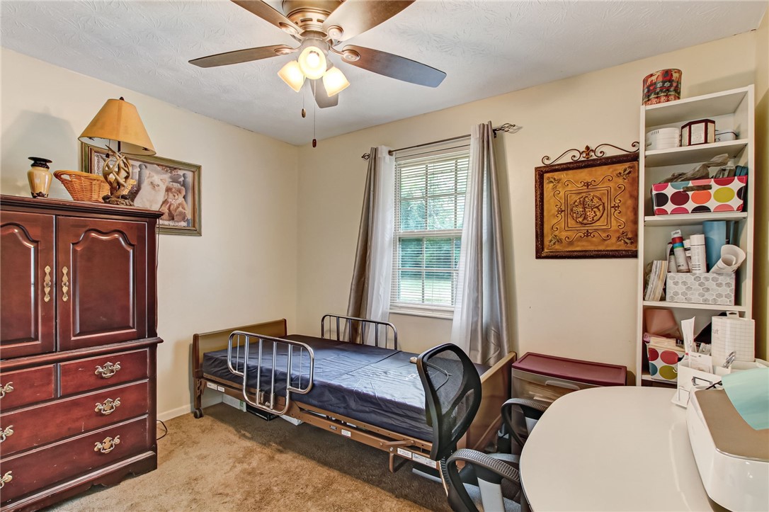 85091 Radio Avenue Yulee, FL 32097 - Photo 18 of 35 a living room with furniture and a window