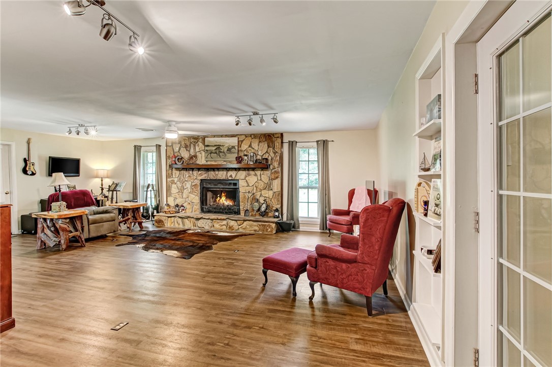 85091 Radio Avenue Yulee, FL 32097 - Photo 22 of 35 a living room with furniture window and a fireplace