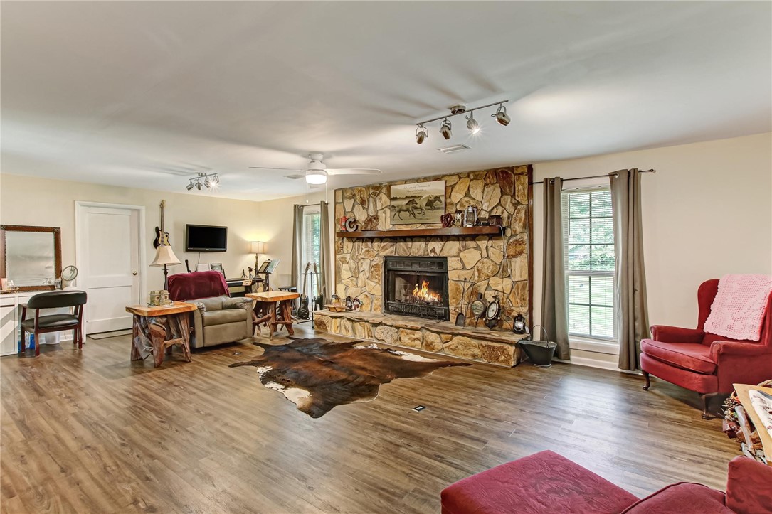 85091 Radio Avenue Yulee, FL 32097 - Photo 23 of 35 a living room with furniture and a fireplace