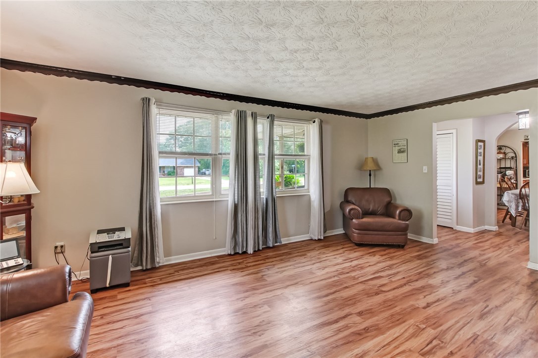 85091 Radio Avenue Yulee, FL 32097 - Photo 7 of 35 a living room with furniture and a wooden floor