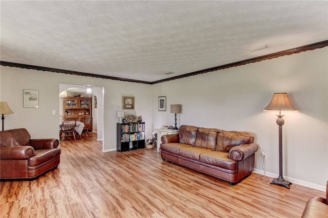 85091 Radio Avenue Yulee, FL 32097 - Photo 8 of 35 a living room with furniture and wooden floor