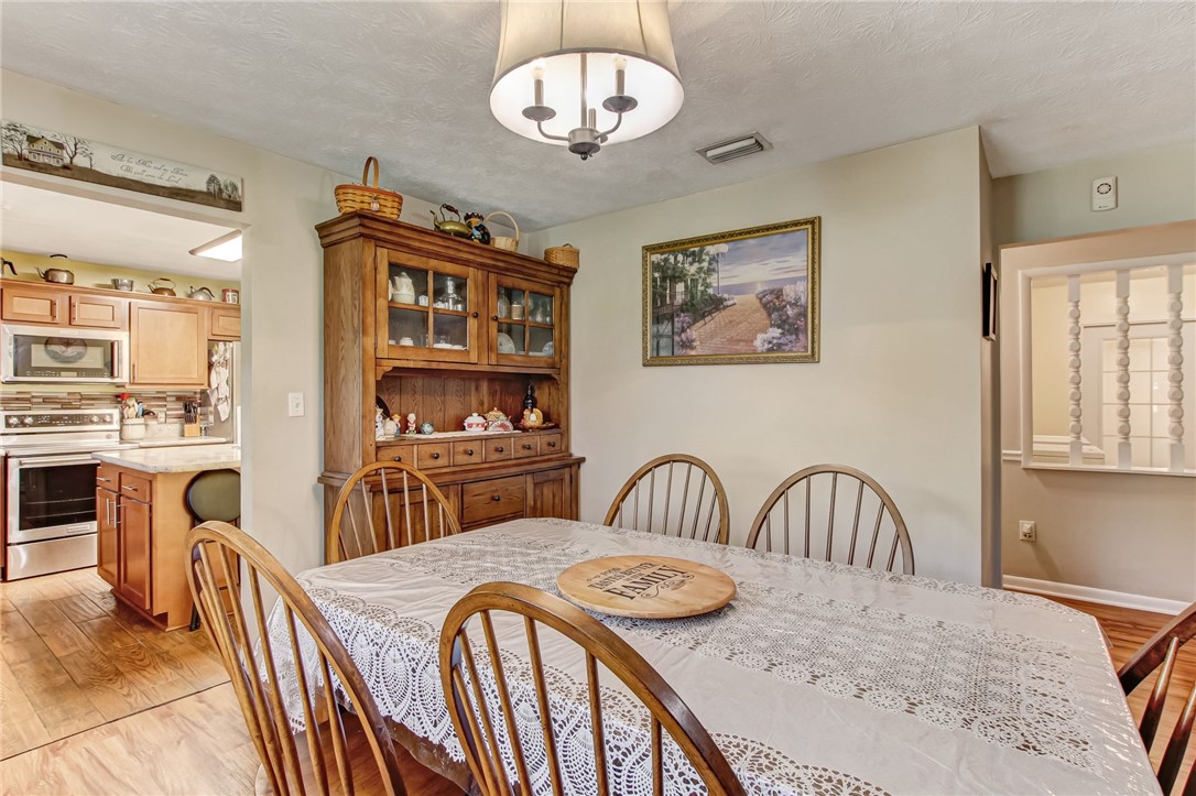 85091 Radio Avenue Yulee, FL 32097 - Photo 9 of 35 a view of a dining room with furniture