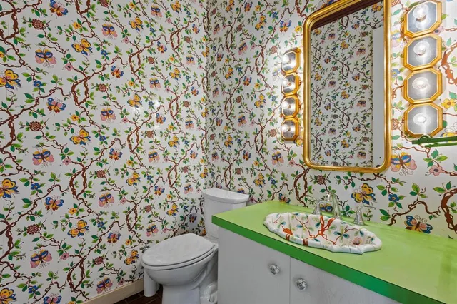 a view of a bedroom with closet window and a yard