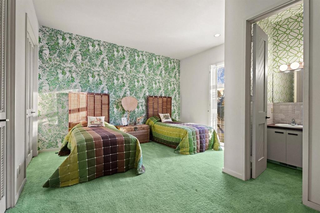 3906 Highland Drive Denison, TX 75020 - Photo 28 of 40 a bedroom with a bed and a mirror