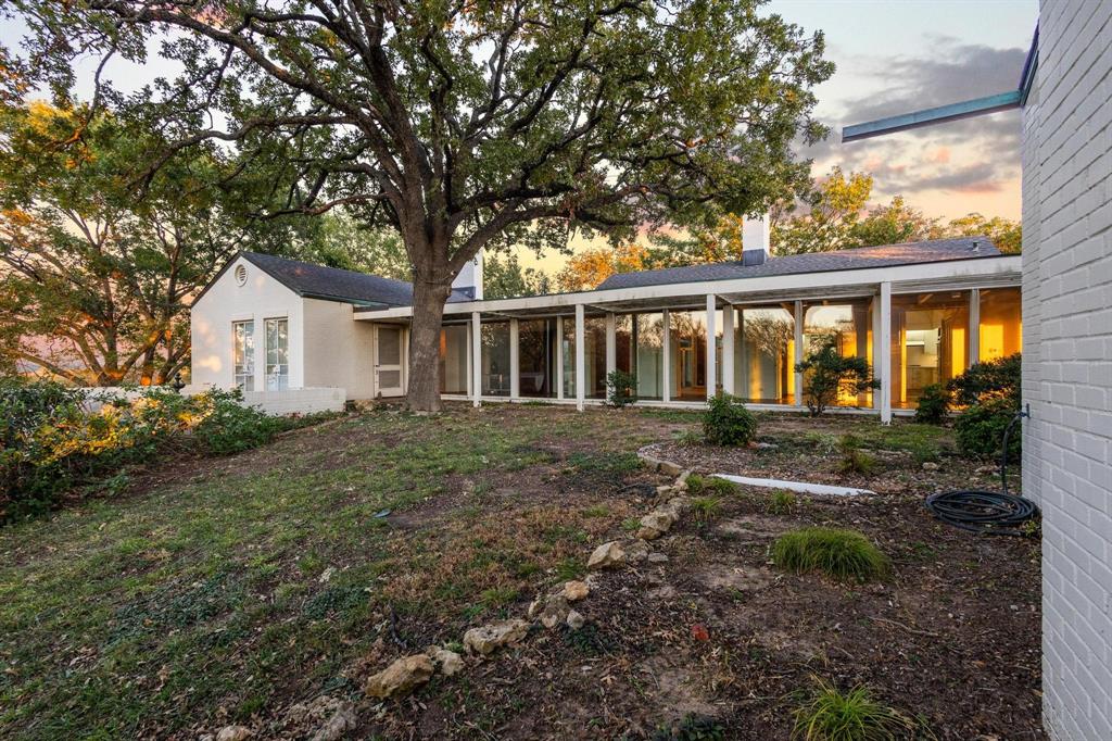 3906 Highland Drive Denison, TX 75020 - Photo 3 of 40 a front view of a house with garden