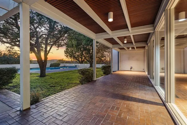 a view of swimming pool with a lake view