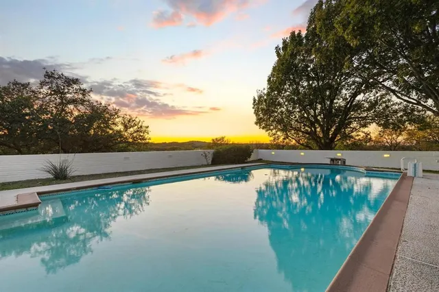 a view of a road with an ocean view