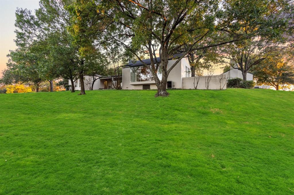 3906 Highland Drive Denison, TX 75020 - Photo 8 of 40 a big yard with large trees