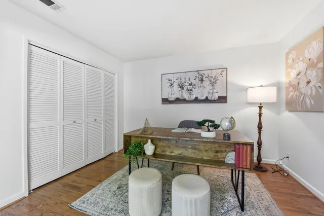 a view of a dining room with furniture