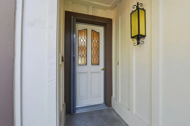 a view of a bathroom from a hallway