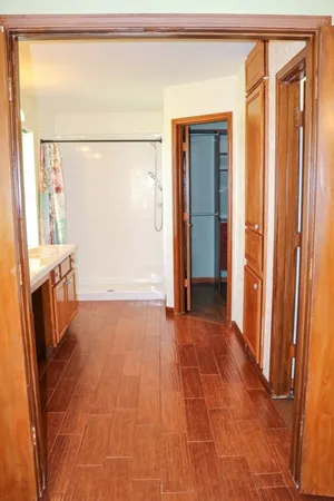 a view of an empty room with a window