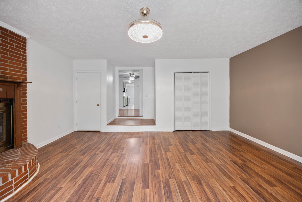 111 East Bon Acre Road Cataula, GA 31804 - Photo 11 of 16 a view of empty room with wooden floor and fan