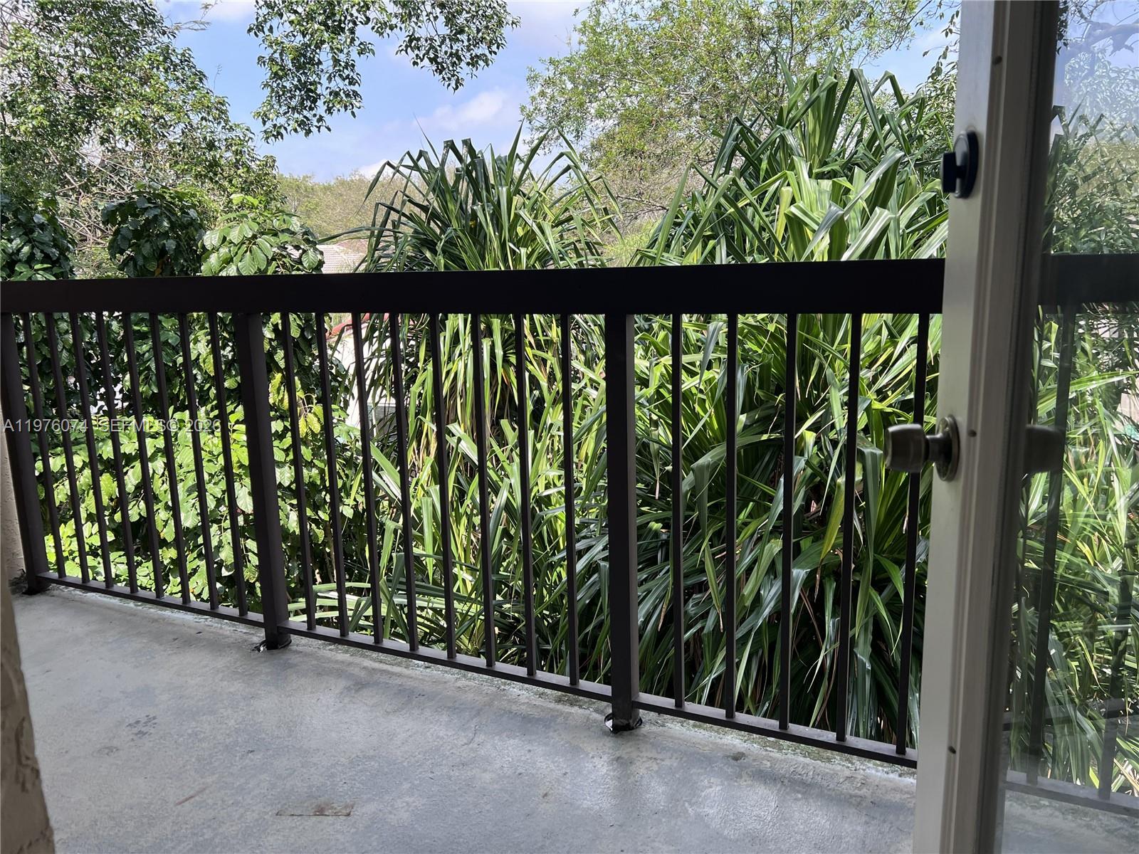4221 West McNab Road, Unit 43 Pompano Beach, FL 33069 - Photo 13 of 23 a view of a street from a balcony