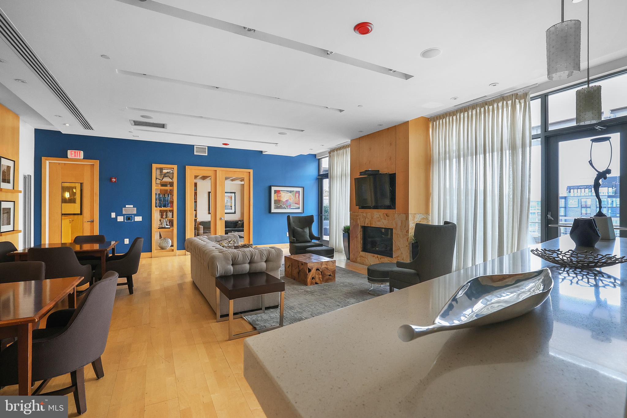 475 K Street Northwest, Unit 920 Washington, DC 20001 - Photo 17 of 25 a living room with furniture and large windows