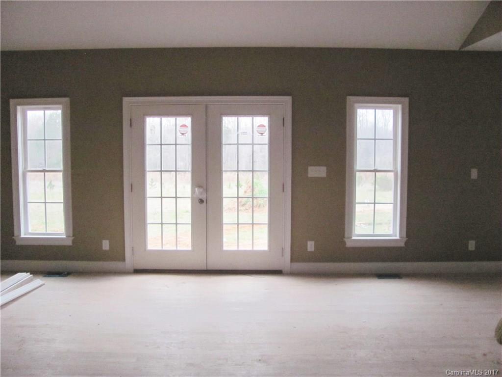 485 Mason Dickson Road, Unit 4 York, SC 29745 - Photo 4 of 12 a view of an empty room with a window
