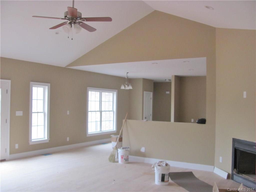 485 Mason Dickson Road, Unit 4 York, SC 29745 - Photo 6 of 12 a view of a livingroom with a fireplace and window