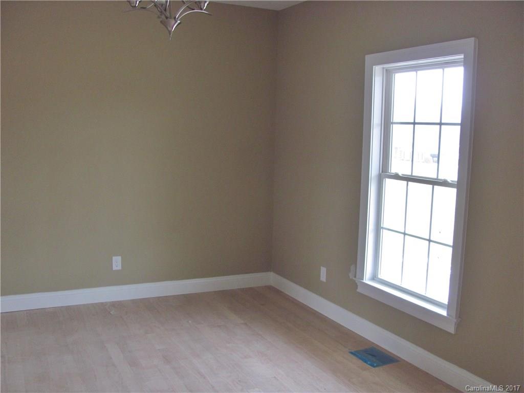 485 Mason Dickson Road, Unit 4 York, SC 29745 - Photo 8 of 12 an empty room with a window