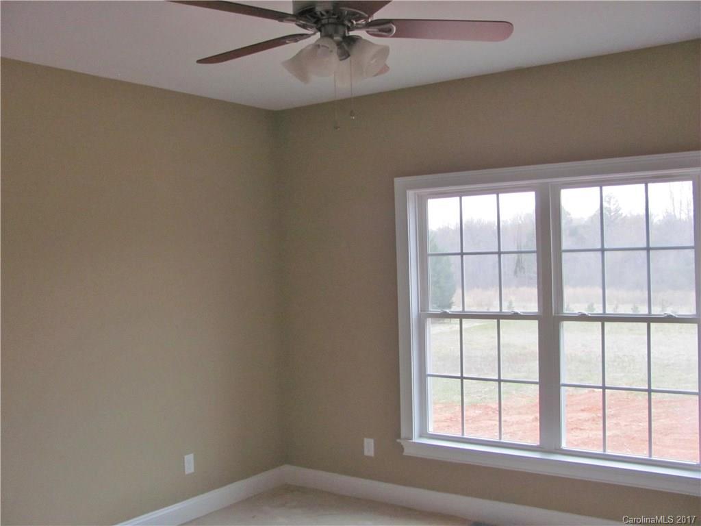 485 Mason Dickson Road, Unit 4 York, SC 29745 - Photo 9 of 12 an empty room with a window