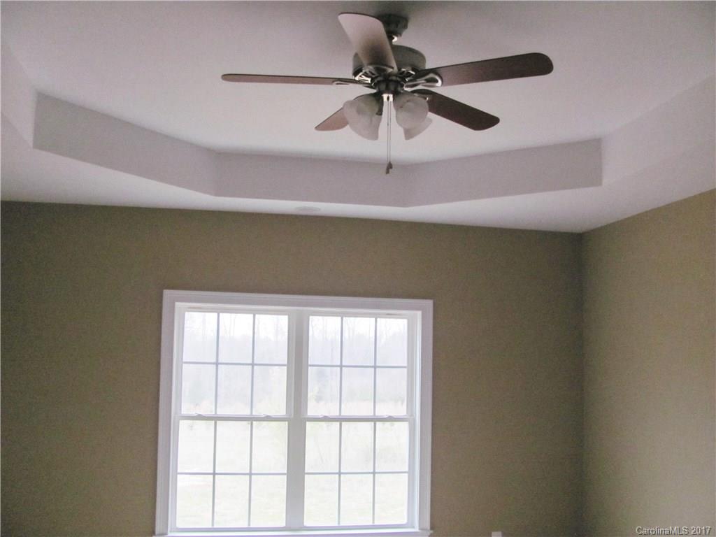 485 Mason Dickson Road, Unit 4 York, SC 29745 - Photo 10 of 12 a view of room with a ceiling fan and window