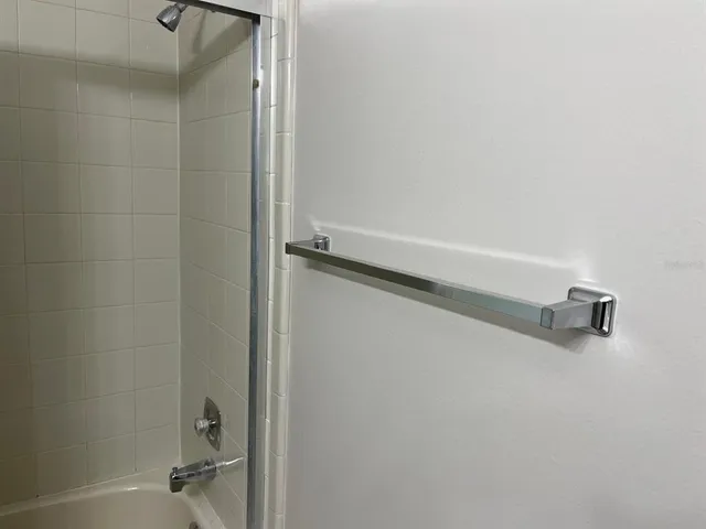 a close view of a shower in bathroom
