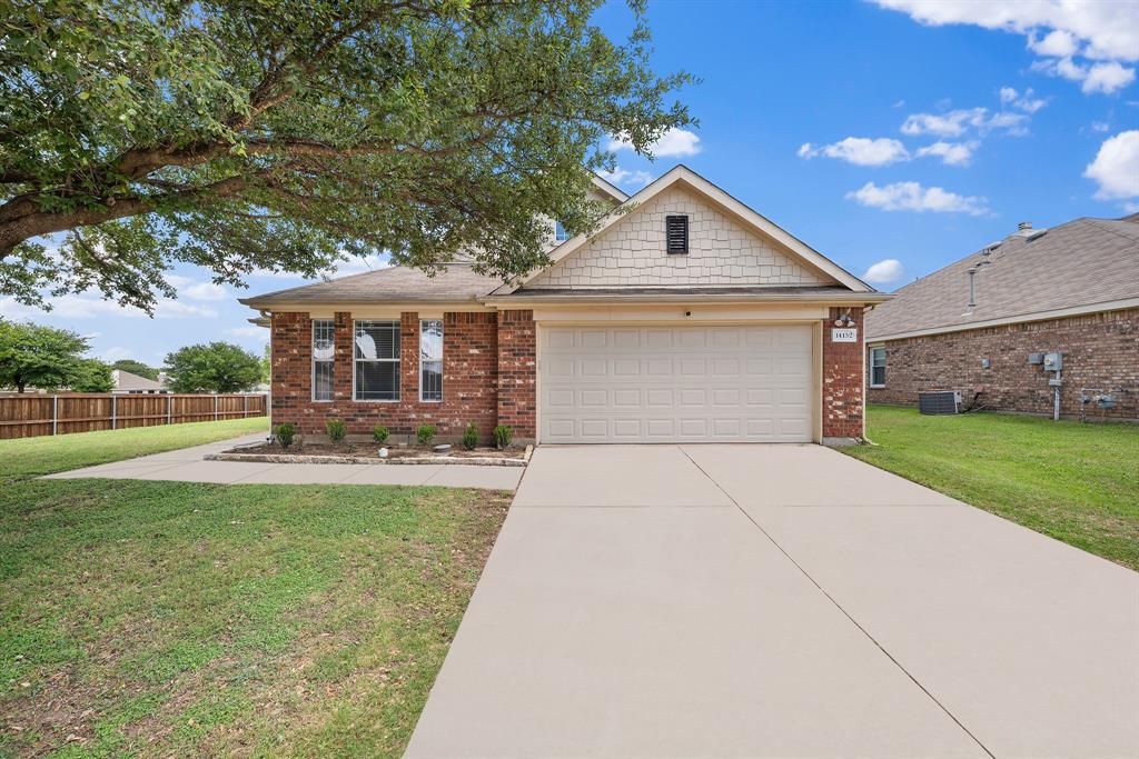 14152 Rodeo Daze Drive Fort Worth, TX 76052 - Photo 2 of 20 Brick exterior with a prominent front-facing garage