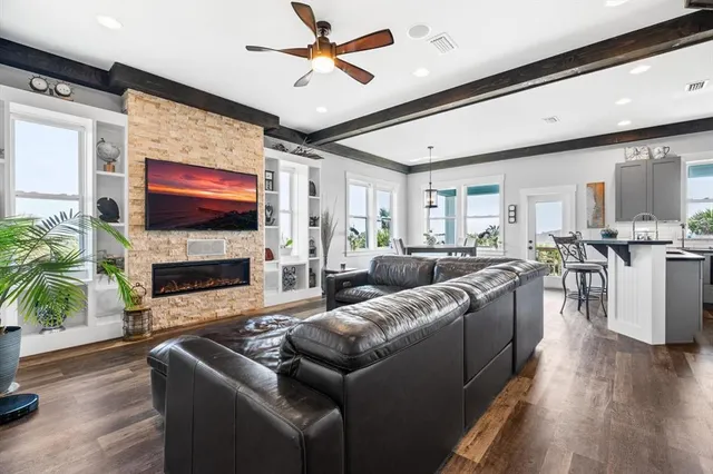 a kitchen with a sink stove and microwave