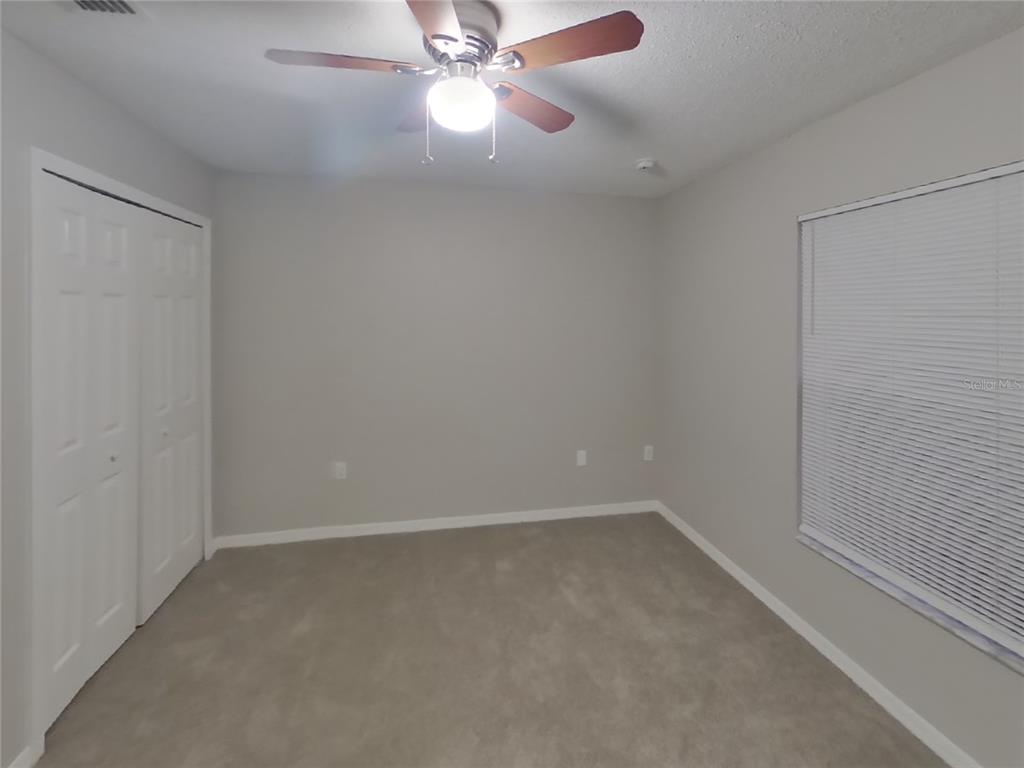 Undisclosed Address Spring Hill, FL 34609 - Photo 13 of 17 wooden floor in an empty room