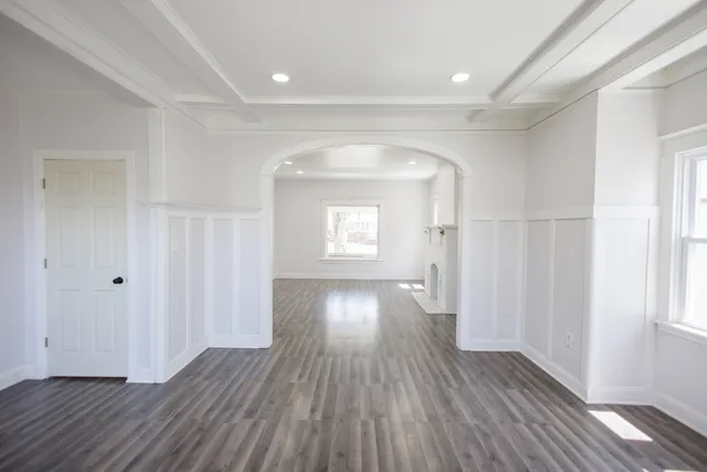 a view of gallery with wooden floor