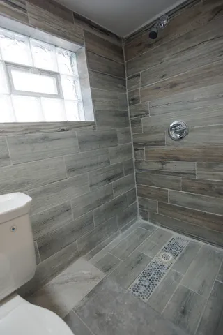 a view of staircase with white walls