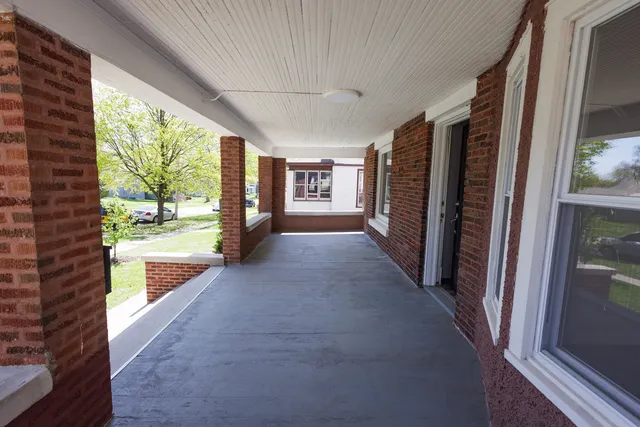 a view of hallway with a large window