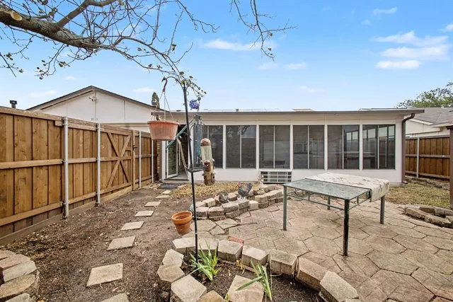 a swimming pool with outdoor seating