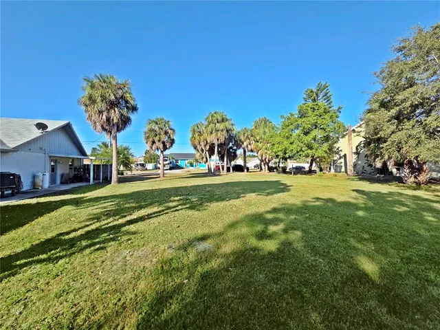 a view of a house with a big yard