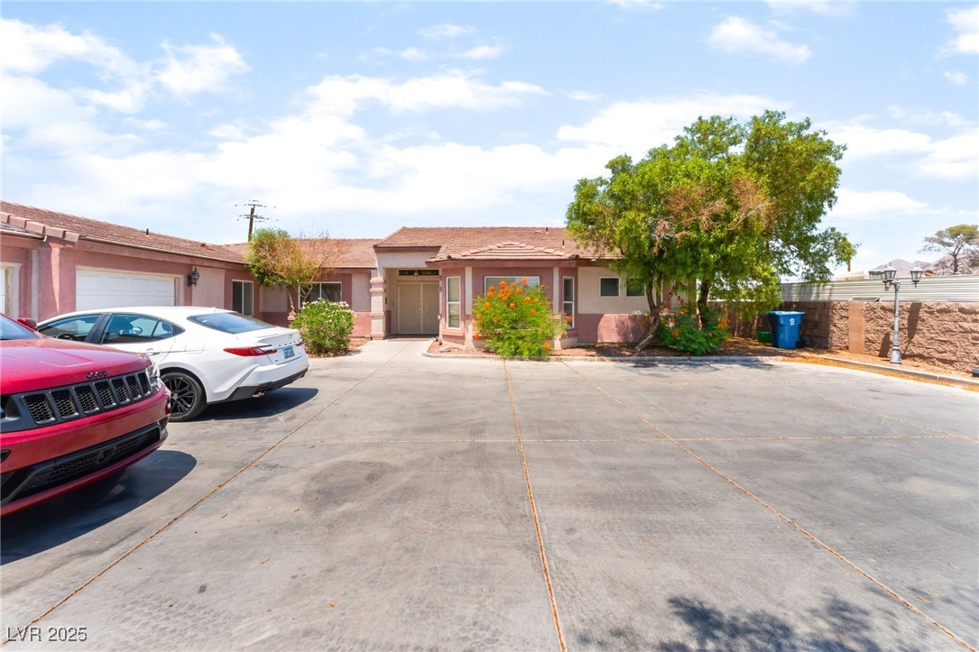 4656 East Desert Inn Road Las Vegas, NV 89121 - Photo 2 of 98 4656 E DI Single story home with stucco siding and uncovered parking