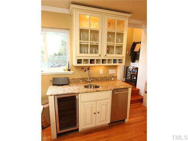 3015 Ruffin Street Raleigh, NC 27607 - Photo 8 of 25 Look at these beautiful custom cabinets!!! Gorgeous granite, wine cooler, Viking stainless steel appl, bright and ready for entertaining. Kitchen