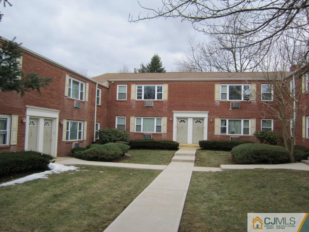 50 Fox Road, Unit 5B Edison, NJ 08817 - Photo 1 of 10 a front view of a house with garden