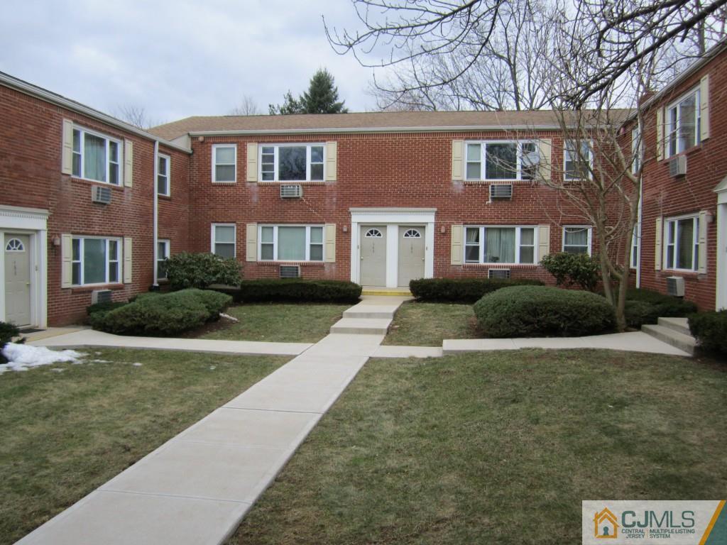 50 Fox Road, Unit 5B Edison, NJ 08817 - Photo 10 of 10 a front view of a house with yard and green space