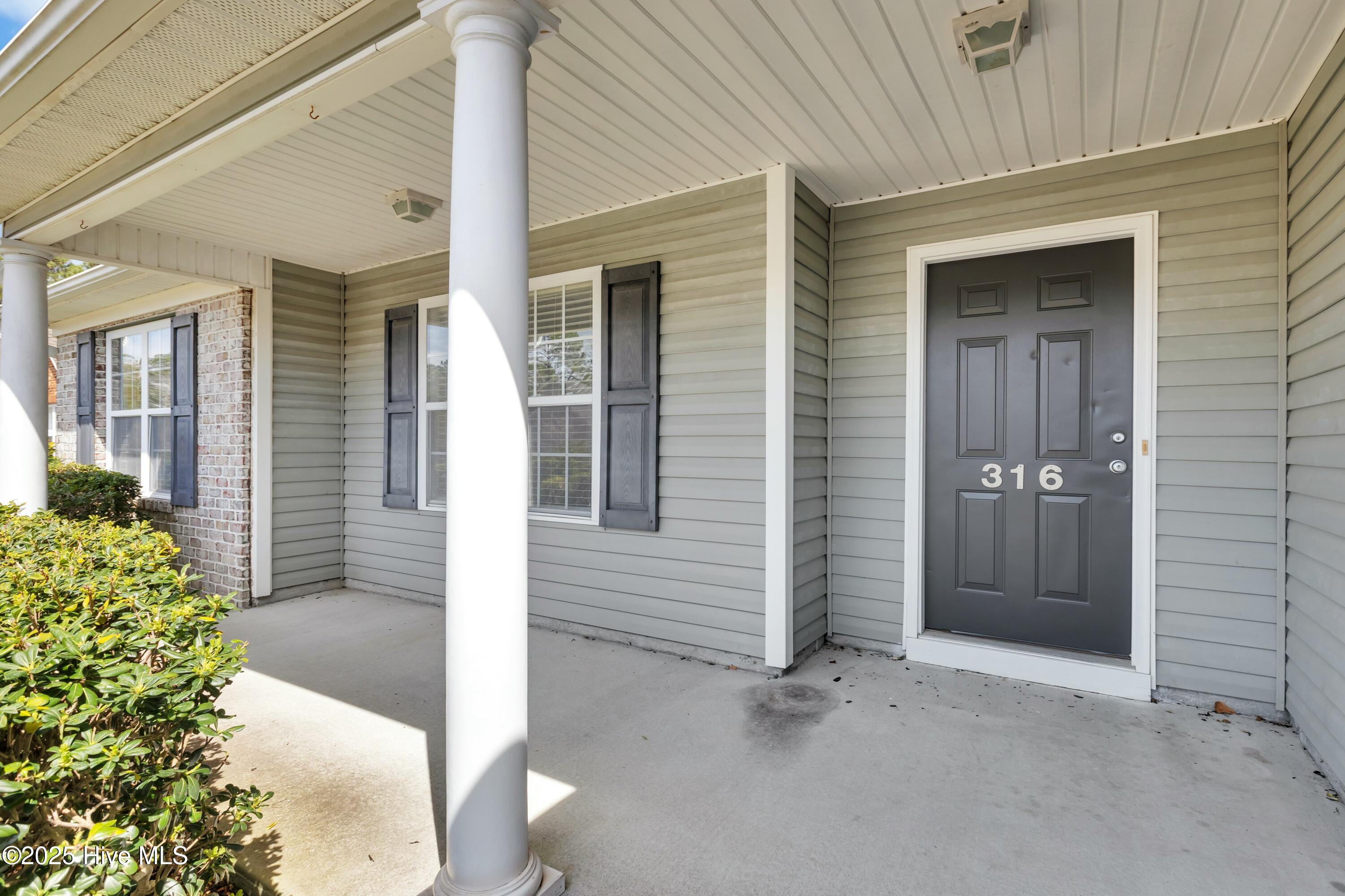 316 Emerald Ridge Drive Hampstead, NC 28443 - Photo 3 of 33 Front Porch
