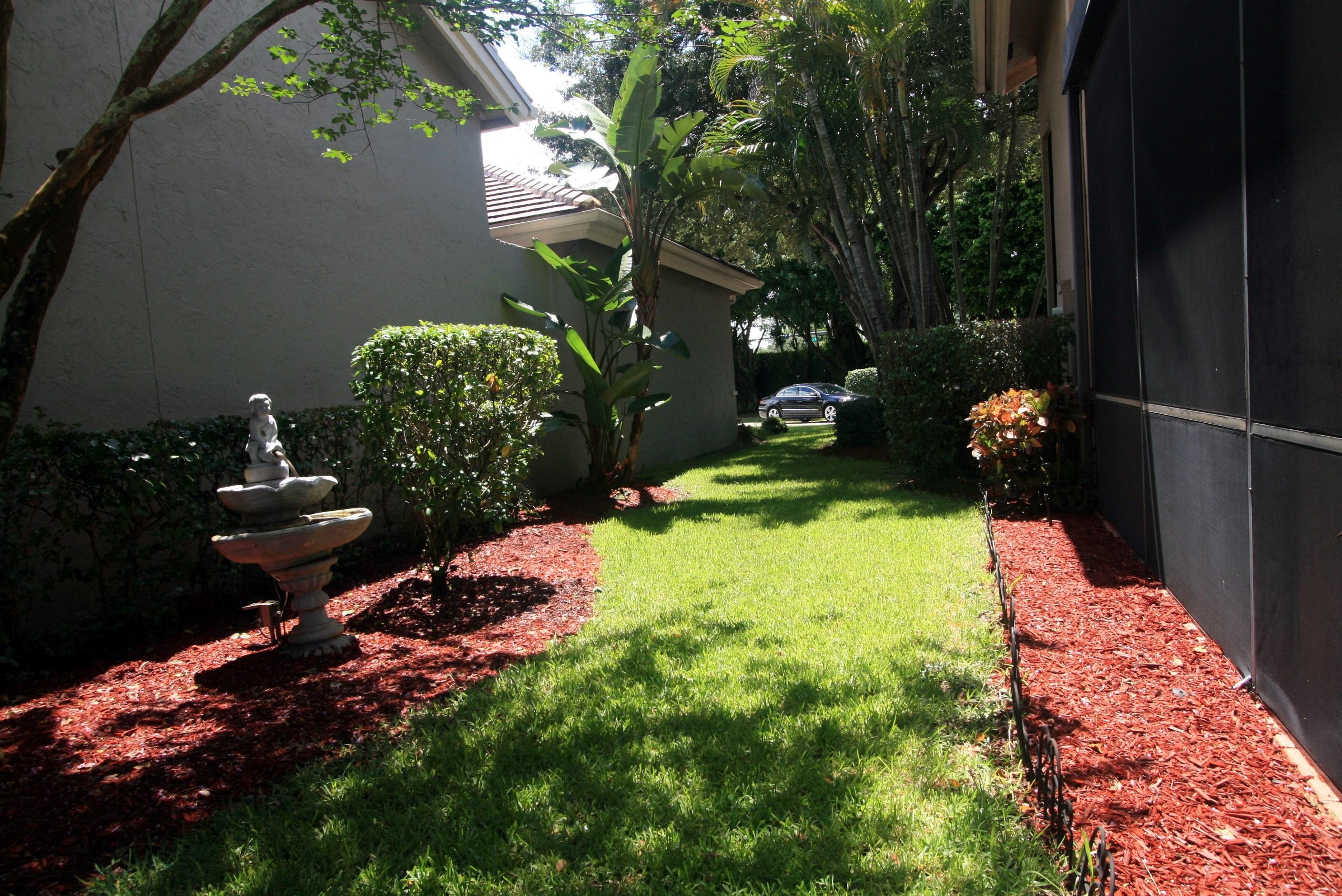 4468 Northwest 29th Way Boca Raton, FL 33434 - Photo 21 of 36 Side Garden