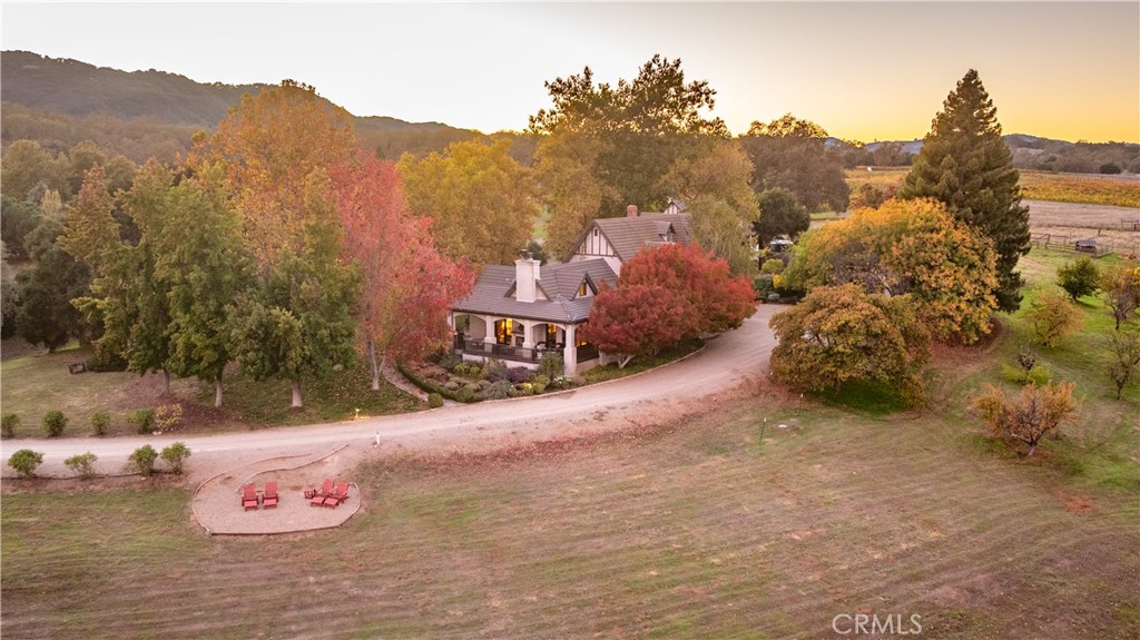 Enchanting home perched above Vineyard Drive showcasing the 360 degree views.
