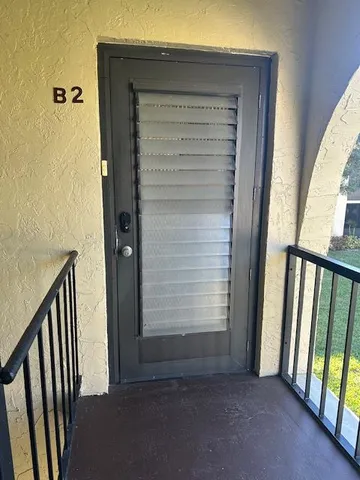 a view of entryway with stairs