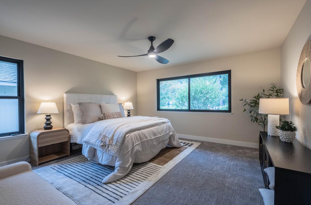 52 Country Club Gate Pacific Grove, CA 93950 - Photo 18 of 37 a bedroom with a large bed and a window