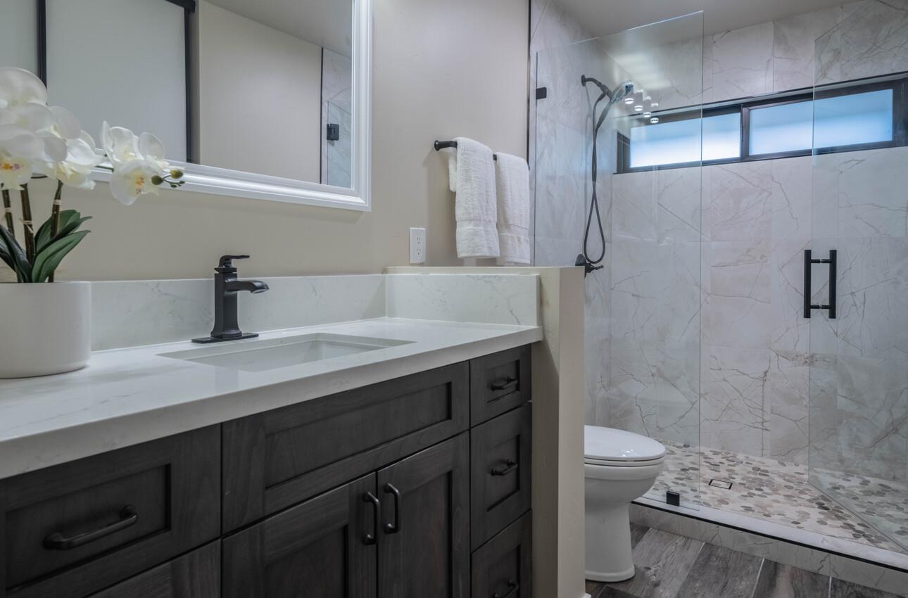 52 Country Club Gate Pacific Grove, CA 93950 - Photo 21 of 37 a bathroom with a sink a toilet and shower