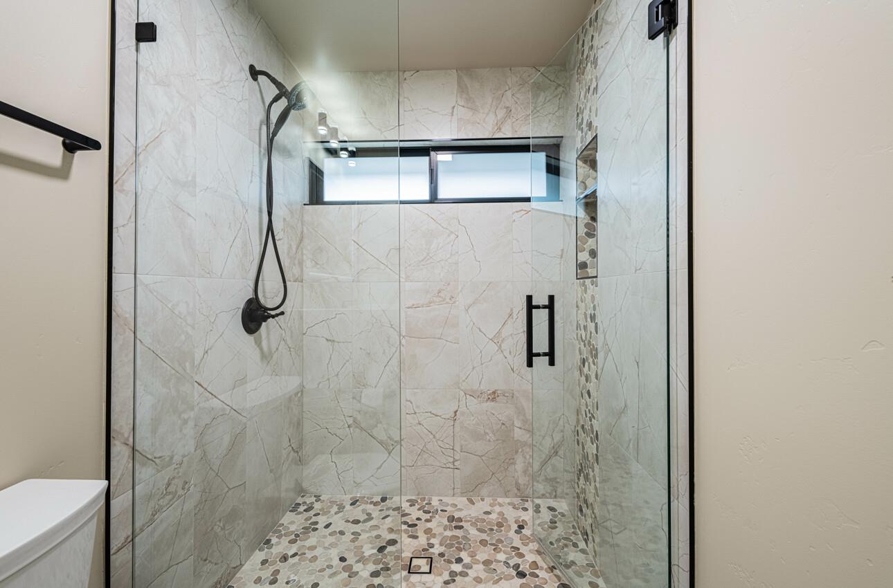 52 Country Club Gate Pacific Grove, CA 93950 - Photo 28 of 37 a bathroom with a shower