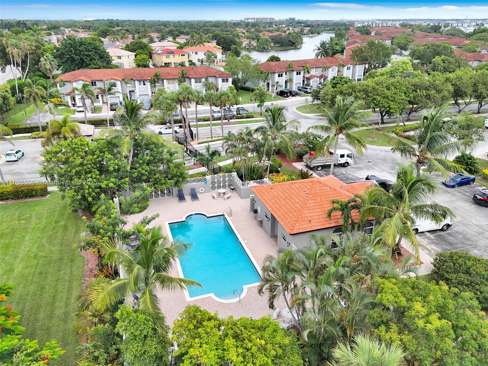 2883 Southwest 129th Terrace, Unit 2883 Miramar, FL 33027 - Photo 18 of 18 an aerial view of residential houses with outdoor space