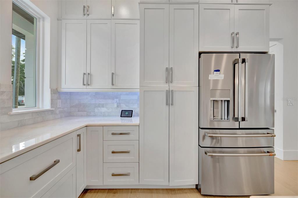 916 Highland Street Sarasota, FL 34234 - Photo 16 of 48 a kitchen with cabinets and stainless steel appliances