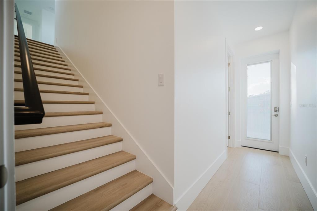 916 Highland Street Sarasota, FL 34234 - Photo 21 of 48 a view of entryway with wooden floor