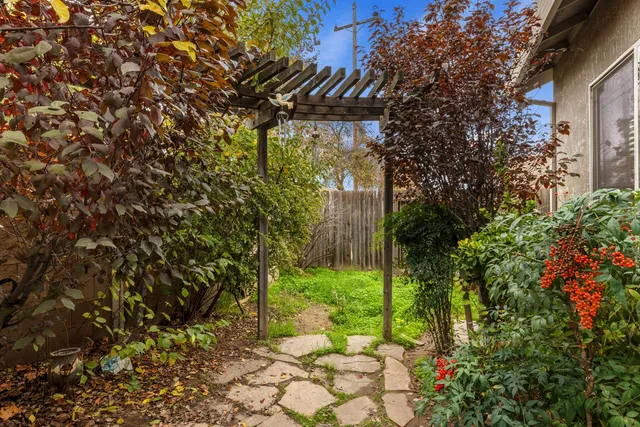 a backyard of a house with lots of green space